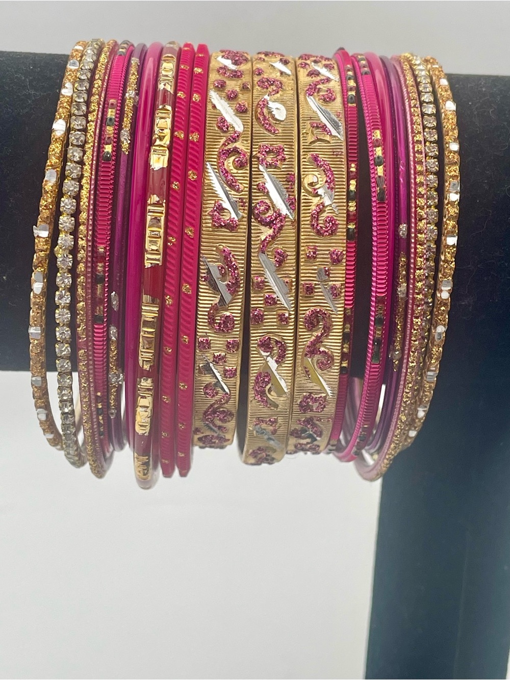Gold and Pink Metal Bangle Stack Bracelet Set. 19 Bracelets. 7 1/2 to 7 3/4 in